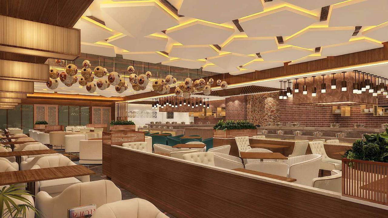 Radisson Blu Towers Kaushambi Delhi Ncr Hotel Gáziábád Kültér fotó Interior of a restaurant